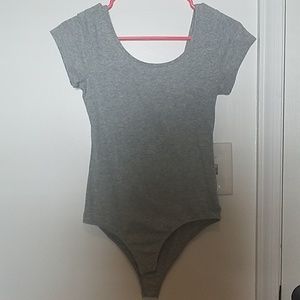Grey body suit